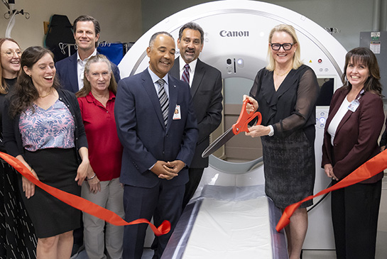 CT scanner groups cuts ribbon