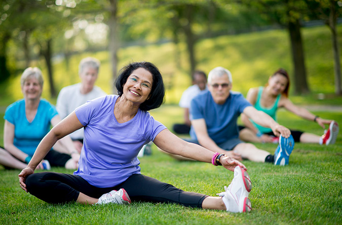 Woman exercising in a group