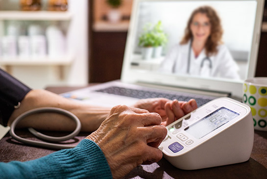 Older adult using telehealth