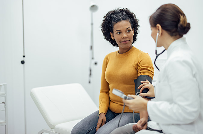 Female patient and doctor