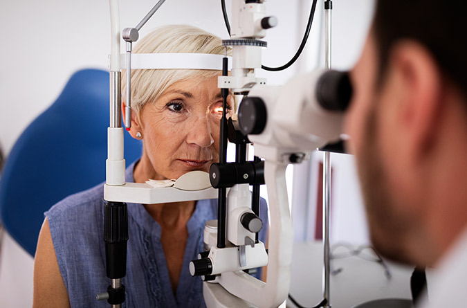 Older woman getting eye exam