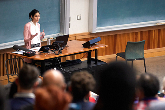 Instructor speaking in front of a class.