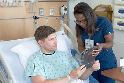 Two women teleconferencing with a healthcare provider
