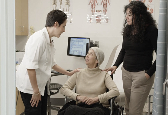 A doctor speaking with a patient.
