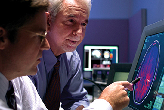 Dan and Cam inspecting a brain.