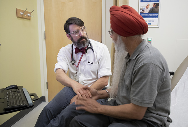 Doctor Rosenberg talking to patient