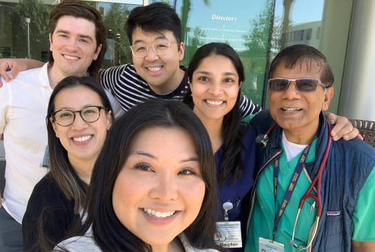 Fellows and faculty enjoying each other's company