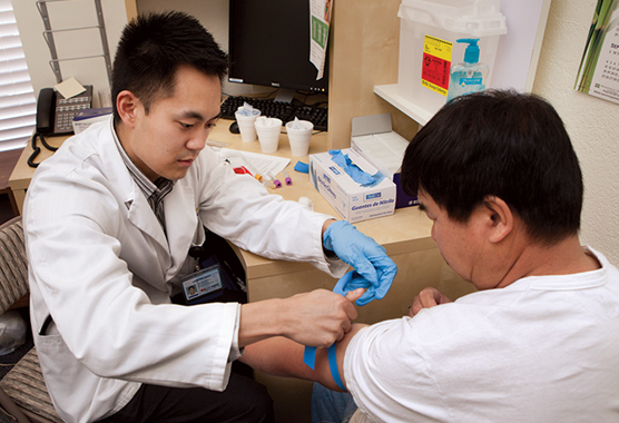 A man having blood drawn.