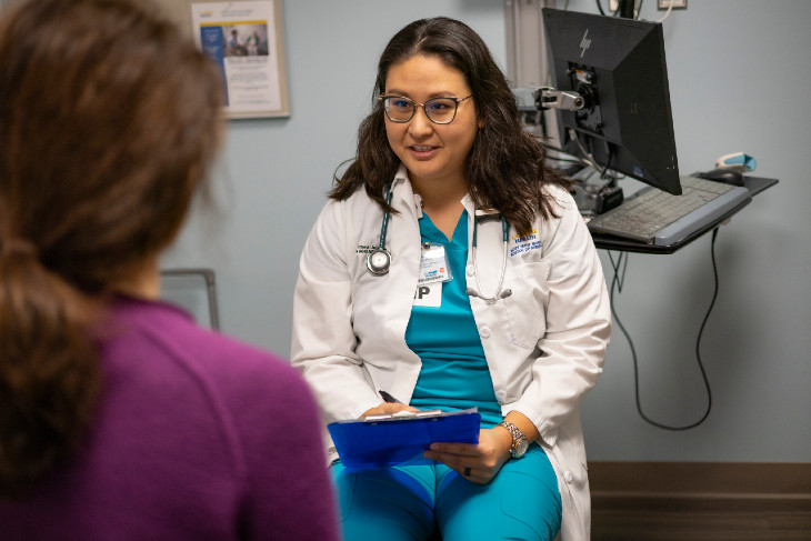 Nurse Practicioner seeing patient.