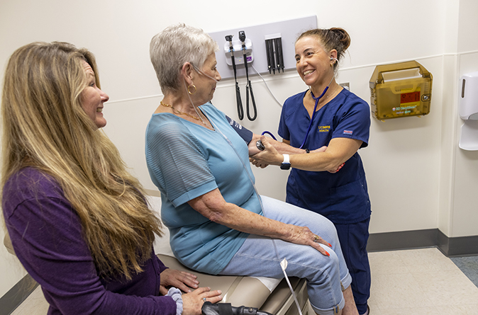 senior patient, caregiver and care provider