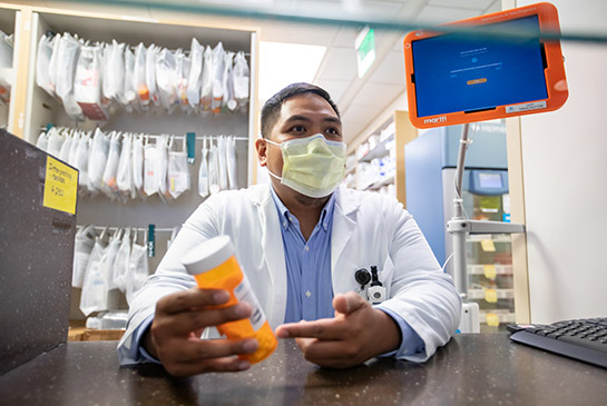 Pharmacist giving consult