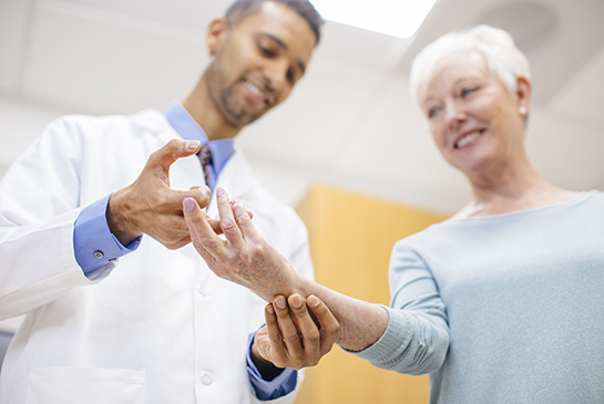 Hand surgeon patient exam