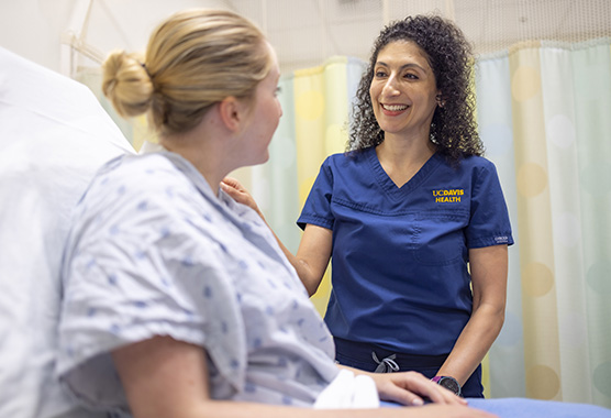 A nurse tending to a patient