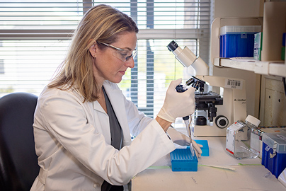 Healthcare researchers wearing eye protection. 