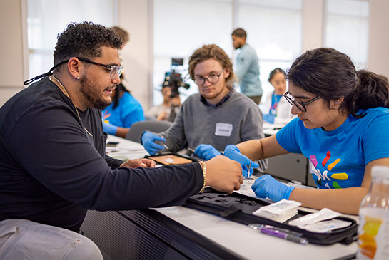 AvenueM students learning about medical careers and pathways