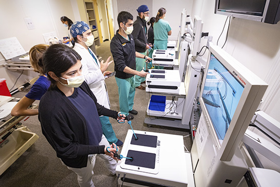 medical students receiving surgical skills training