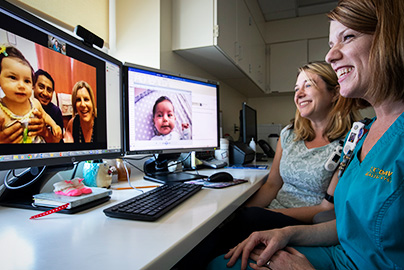 NICU provider and nurse on telehealth call with family