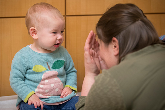 Child Playing Peekaboo