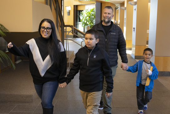Family entering the UC Davis MIND Institute