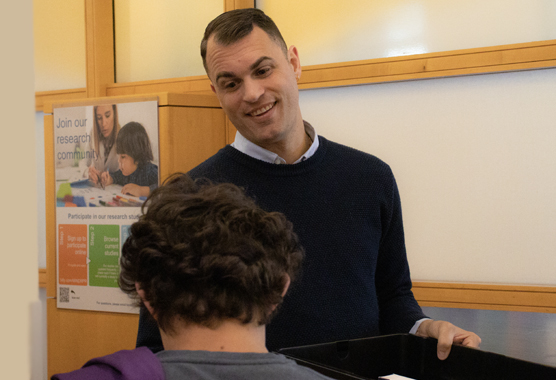 Postdoc working with a participant