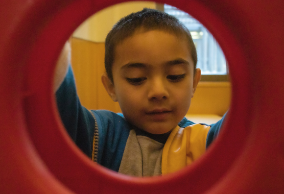 boy playing connect four