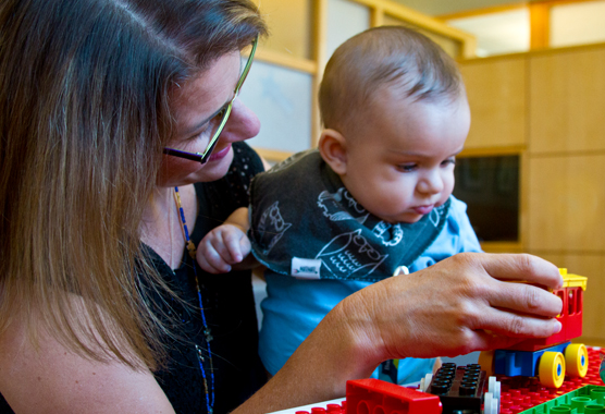 researcher playing with a child