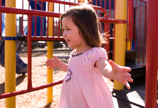 girl playing on playground