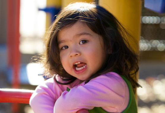 child on the playground at the MIND institute