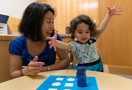 a researcher working with a participant