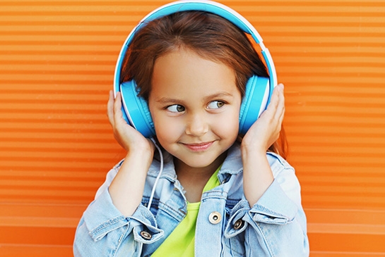 girl wearing headphones