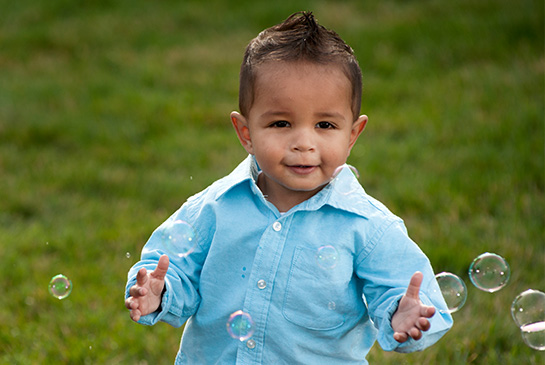 little boy with bubbles