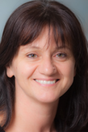 Simona Ghetti Ph.D. smiling in a professional headshot
