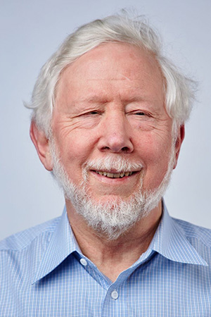 Kim T. Mueser, Ph.D. smiling in a professional headshot
