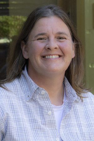 Melissa Regester smiling in a professional headshot