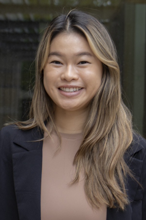 Maggie Zheng, B.S., B.A. smiling in a professional headshot