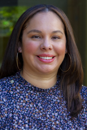Vanessa Avila-Pons smiling in a professional headshot