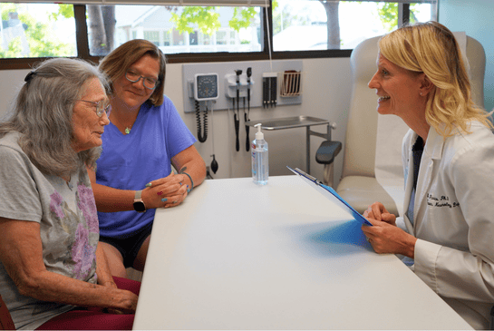 doctor and patient interacting and smiling