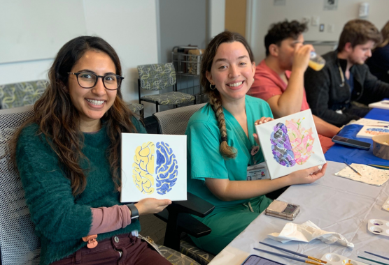 Residents painting pictures of brains