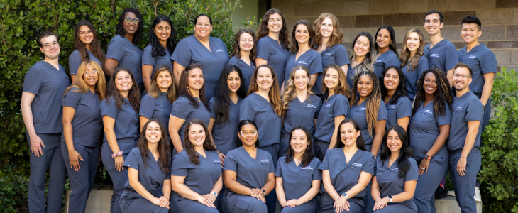 Group photo of OBGYN residents outdoors at the UC Davis Health Sacramento campus.