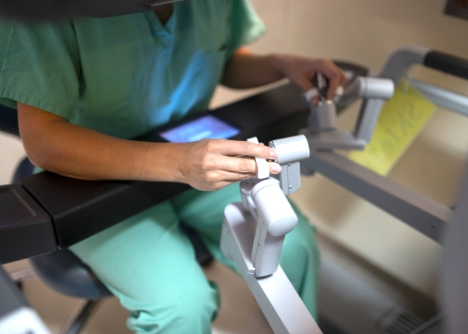 doctor performing robotic surgery