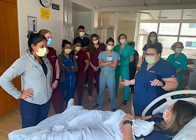 fellows training in birthing room