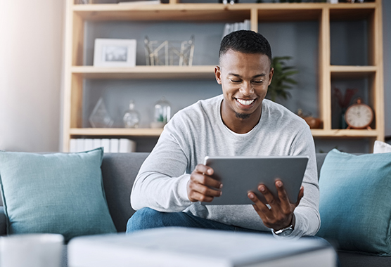 Man looking at an iPad