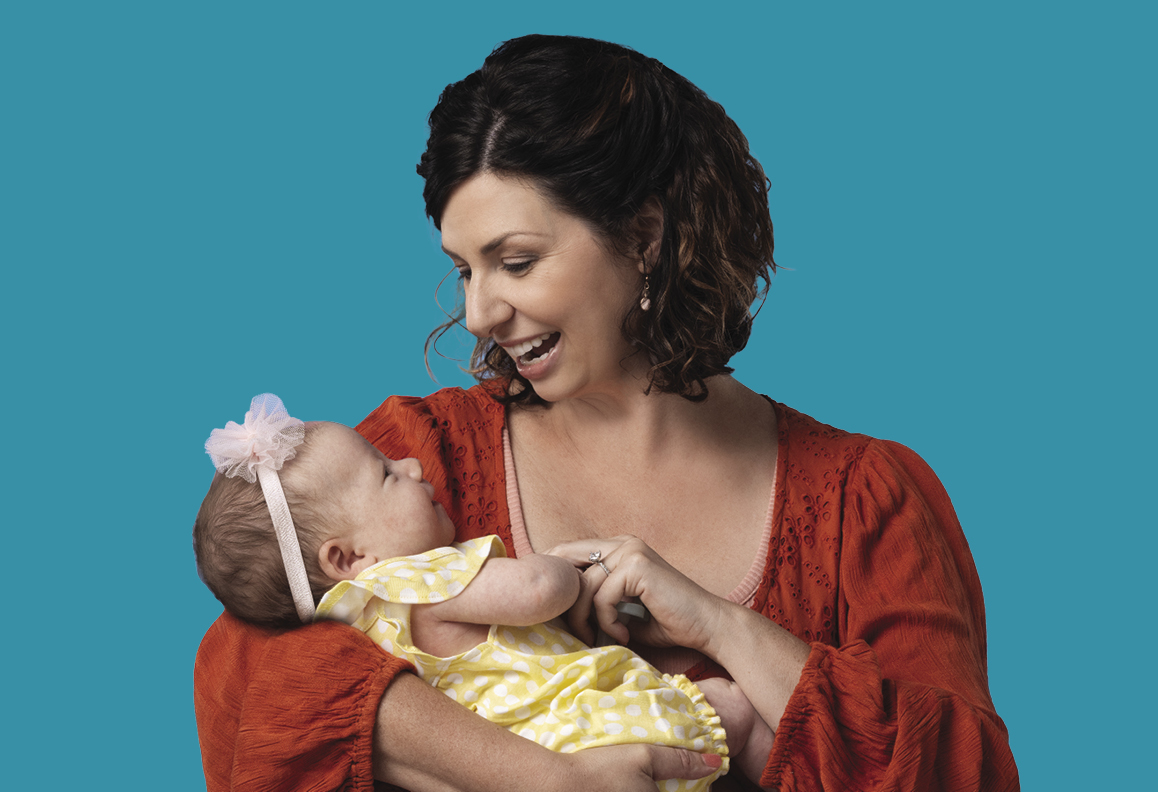 High-risk maternity patient Nadine holding her baby