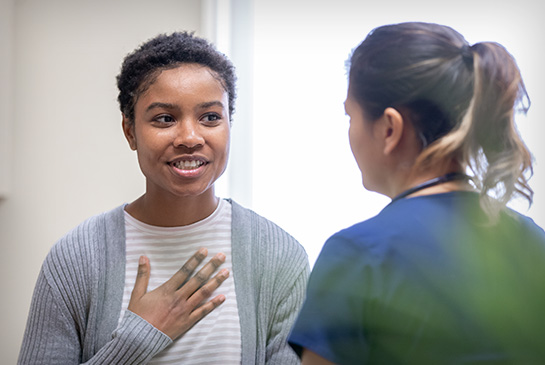 Young woman talking honestly with her provider