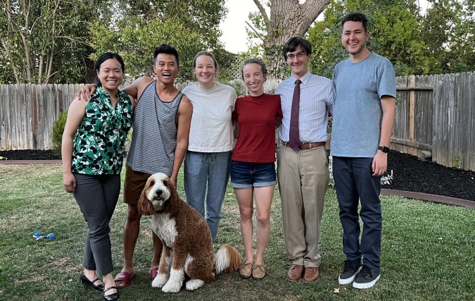Endocrinology fellows pose for photo in resident house backyard.