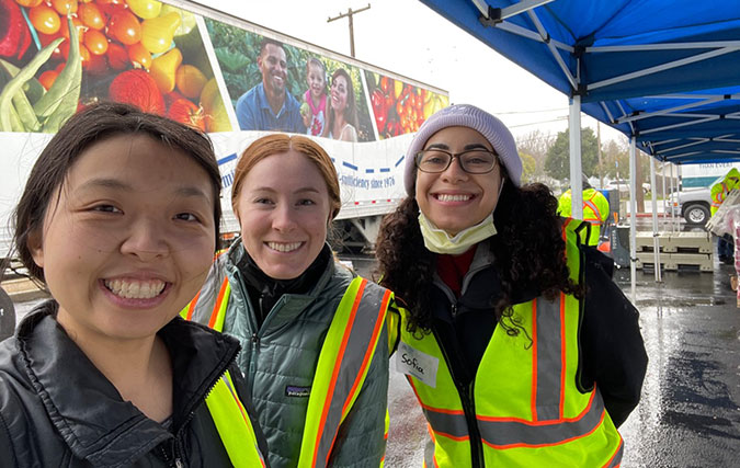 Three residents volunteer at food bank Sacramento.