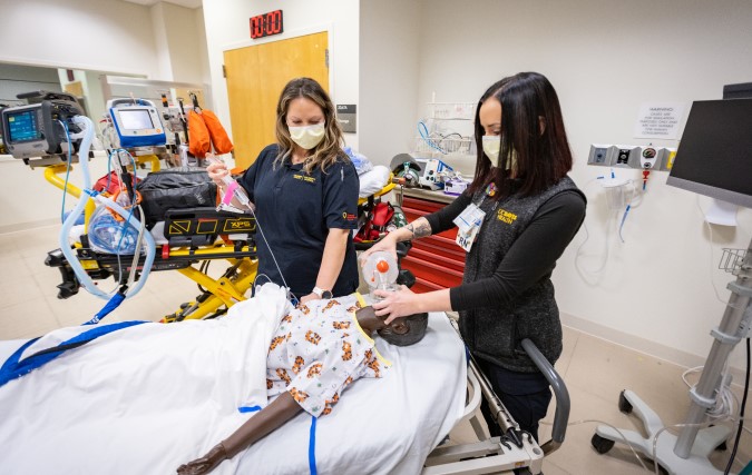 Transport team practices on pediatric test manikin.