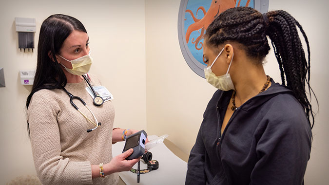 Dr. Willen seeing patient in sickle cell clinic