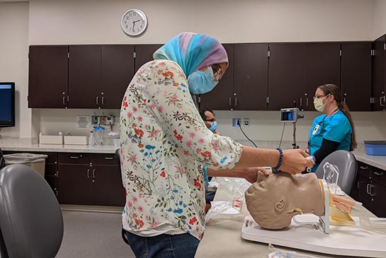 Thursday Didactics, residents in conference while faculty presents