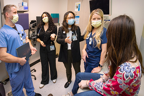 The pediatric pulmonology team with a patient at UC Davis Health.